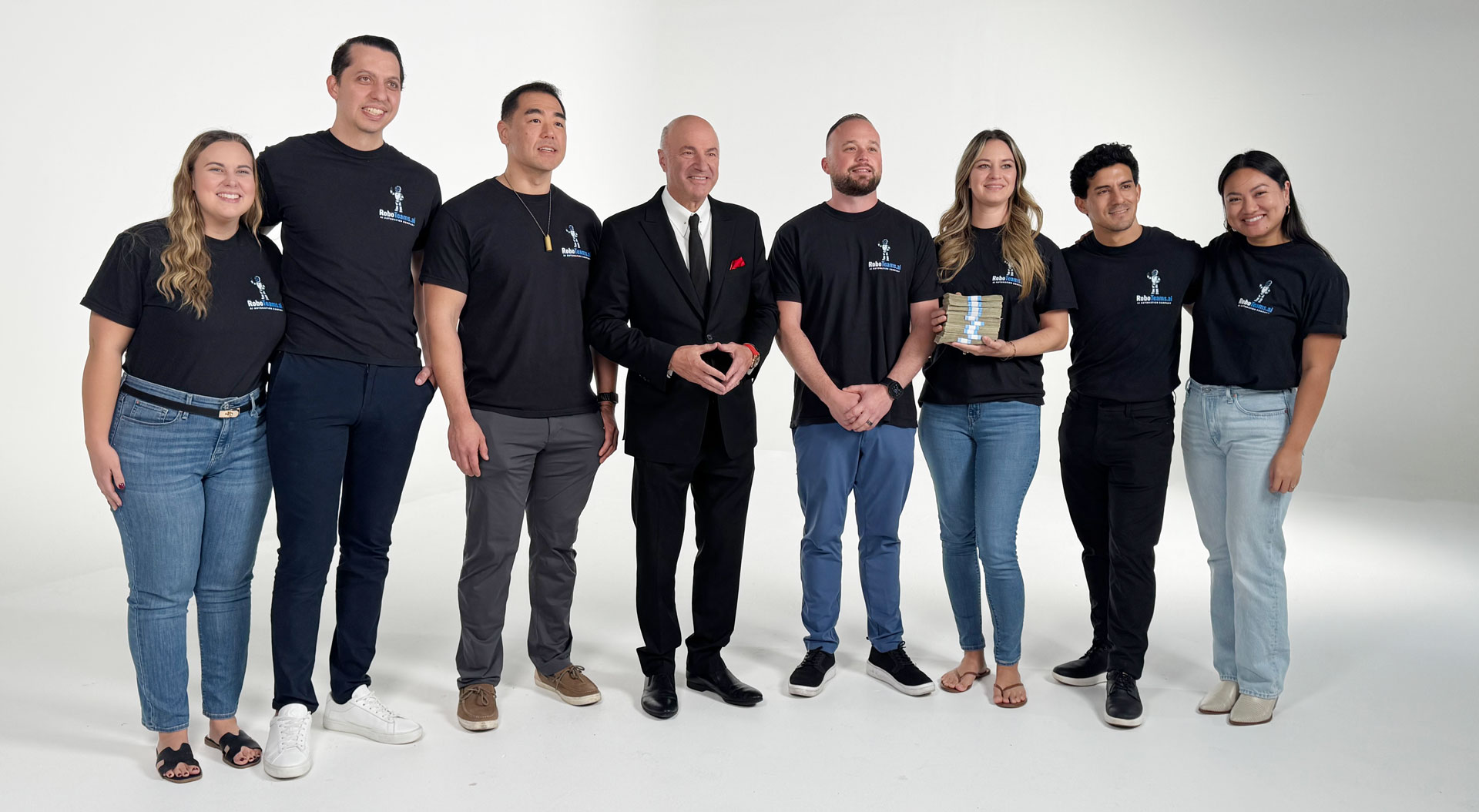 Kevin O&rsquo;Leary on set with the team building the AI automations for one of his companies